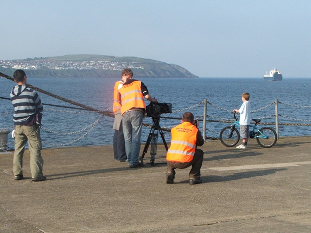 Young actor Peter Castellucci and film crew at work